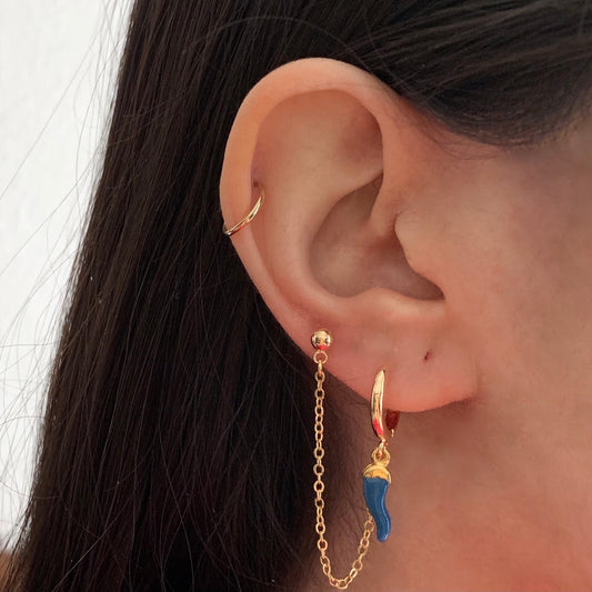 Piercing doble/chile azul