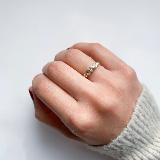 Anillo 5 zirconias